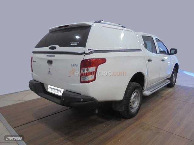 Mitsubishi L 200 2.5DI-D Double Cab. M-PRO + Paragolpes L200 y Sensor Parking de 2019 con 123.640 Km por 23.690 EUR. en Madrid